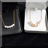 J11. Gold and pearl necklaces. 
